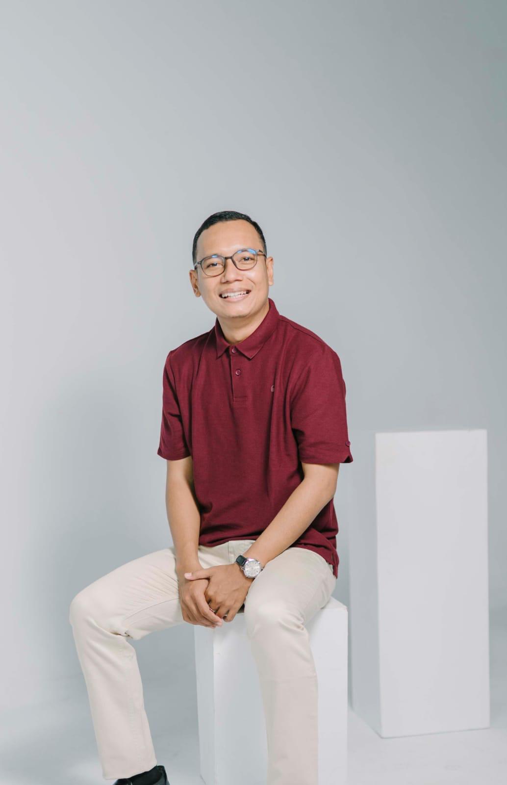Kasmariadi Dahlan, S.Pd
